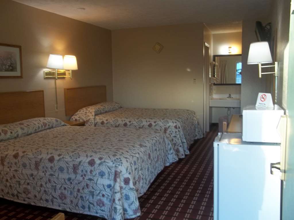 Economy Inn Маккук Номер фото